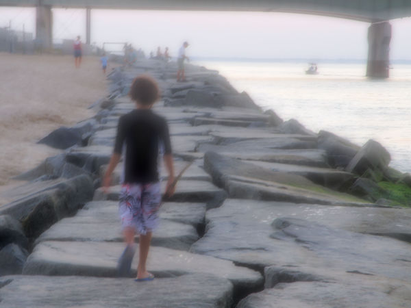 My son walking away. Retouched using SOFT FOCUS....