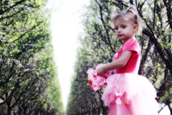 My daughter, playing in the orchards...