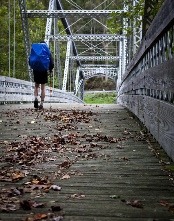 Hiker on Appalachian Trail bridge...
