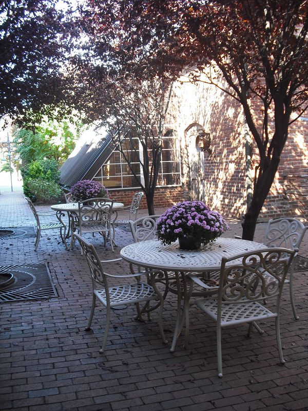 Outdoor dining area on edge of historic Winston Sa...