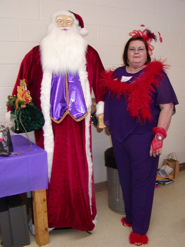 Here I am with Santa at an Ornament Exchange we ha...