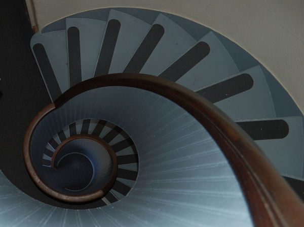 Spiral staircase inside the Point Loma light house...