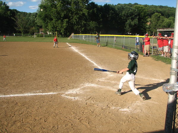 This photo is my Grandson's first home run of the ...