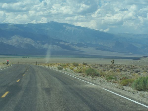 Dust devil from moving car...