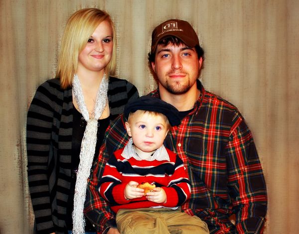 My oldest son his wife and my Grandbaby...