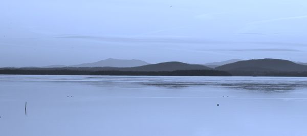Monochromatic frozen Lake Champlain viewing Vermon...