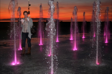 My daughter, fountains and a sunset...