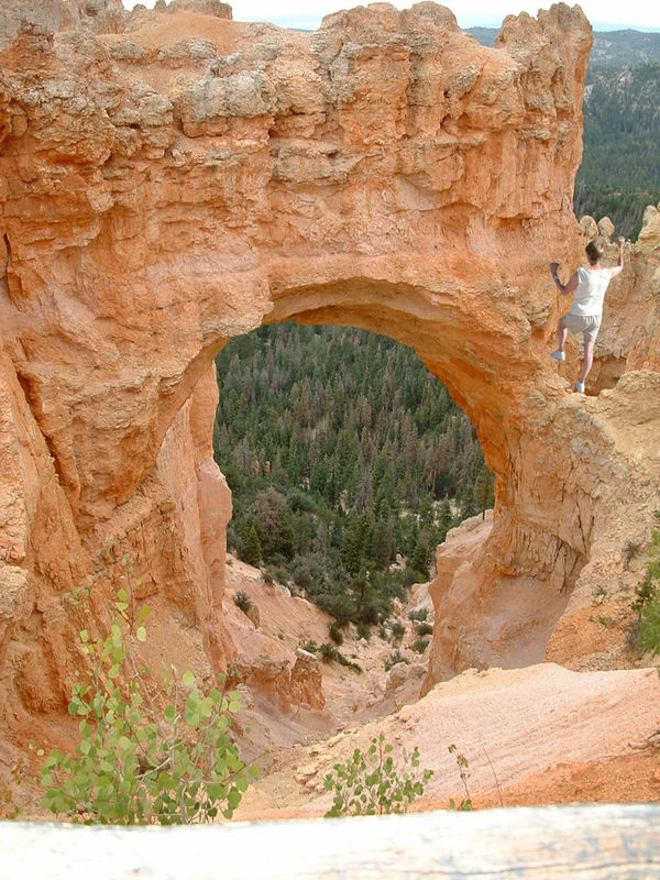natural bridge in Bryce Canyon looking for a foot ...