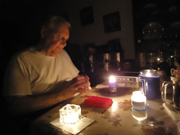 Playing Rack-O by candlelight!...