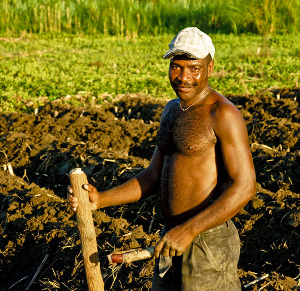 Sugar Cane farmer. Does it all by hand like back a...