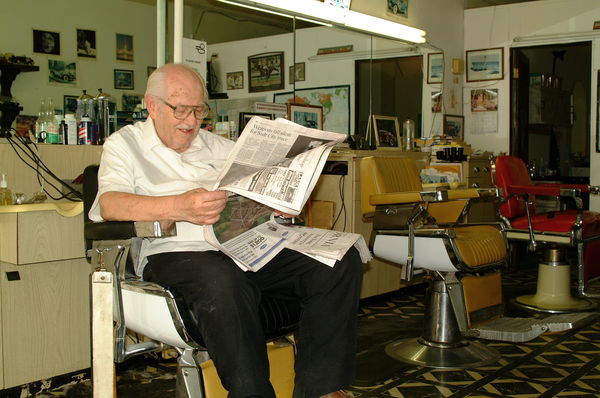 My barber. (Nearly 90 and still at work...)...