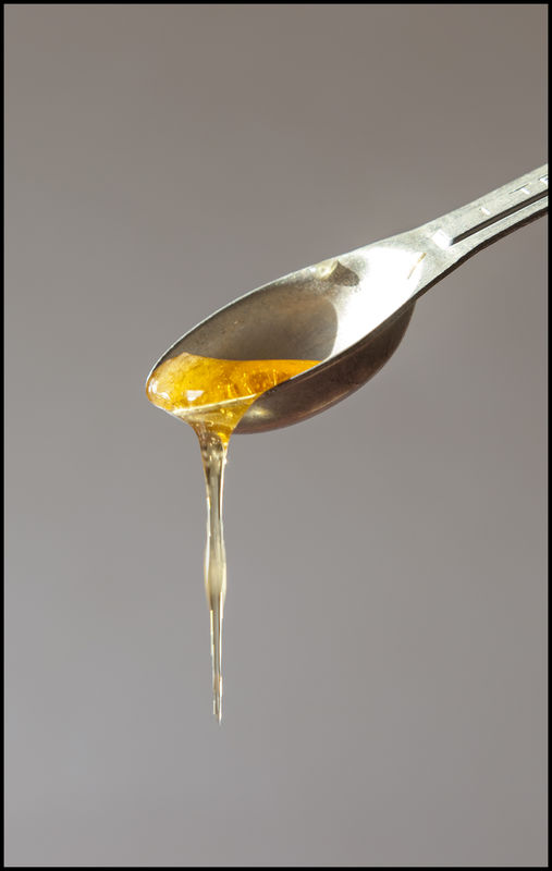 My Sweet. Honey dripping from the measuring spoon....