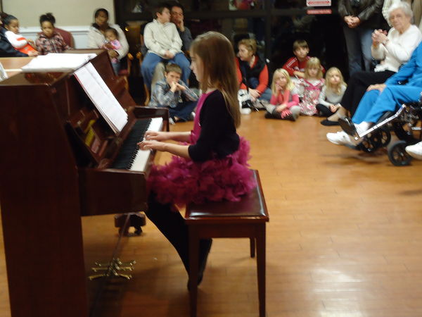 Maddie playing the piano...