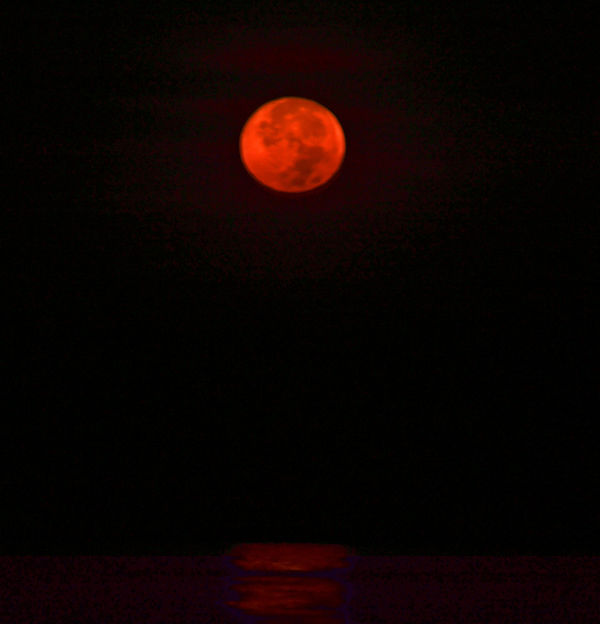 Red Moon set over the sea...