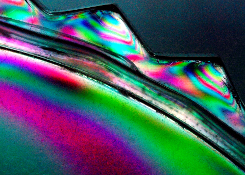 The Edge of a clear plastic case polarised...