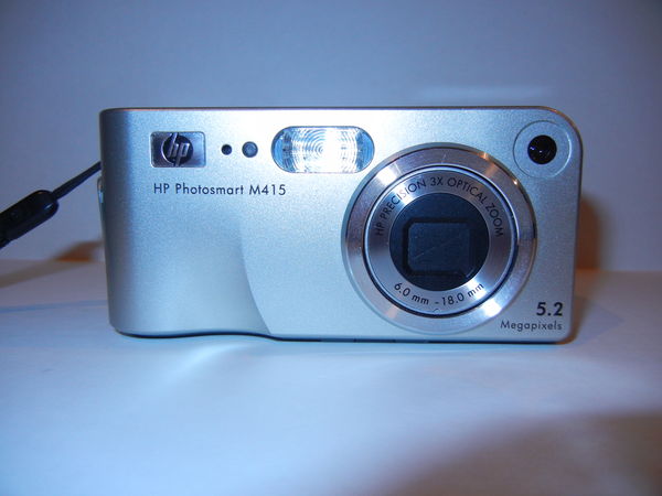 HP Photosmart M 415 3X  zoom 5.2  pixels...
