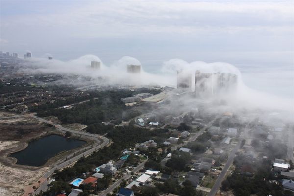Panama City Beach, Florida -- Fog rolls up along t...