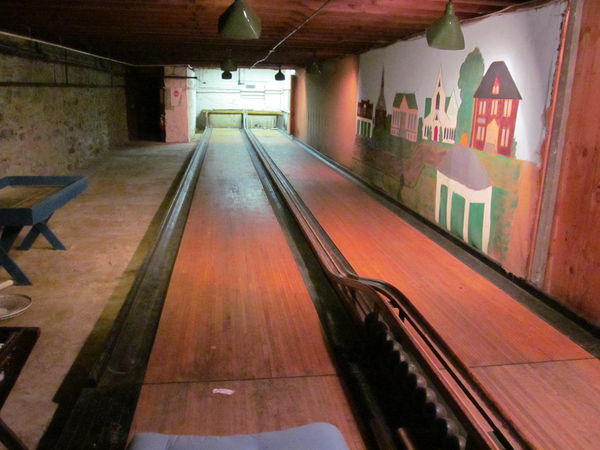 Two lane candlepin bowling alley in the cellar of ...