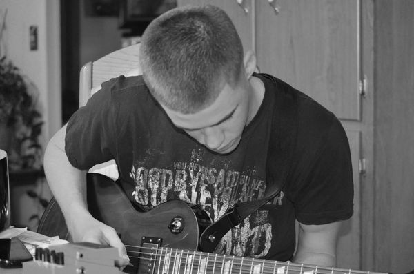 My son Playing guitar...