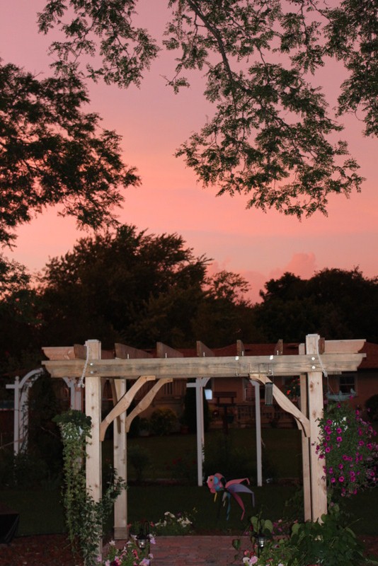Patio Pergola-Storm was coming up just at sunset s...