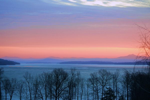 Strange aura over frozen Lake Champlain at sunrise...
