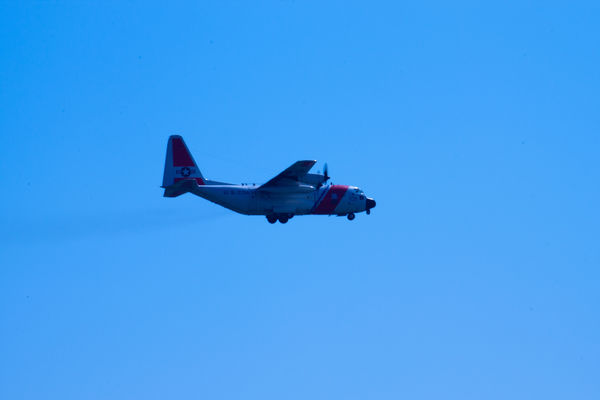 flying overhead (Guard C-130)...