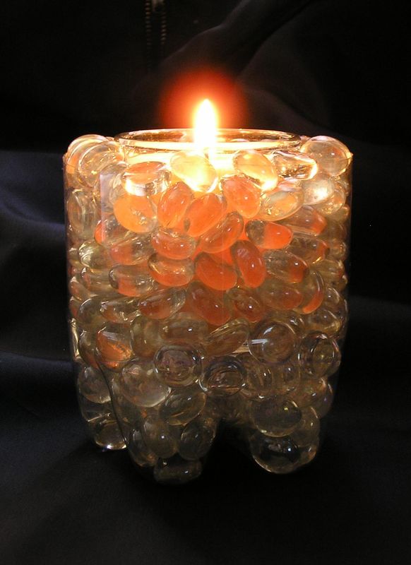 plastic bottle, glass beads and a votive candle...
