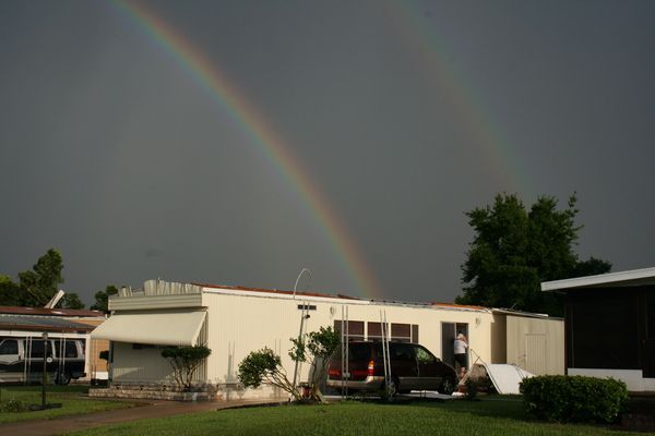 Double rainbow descending on roofless house. Where...