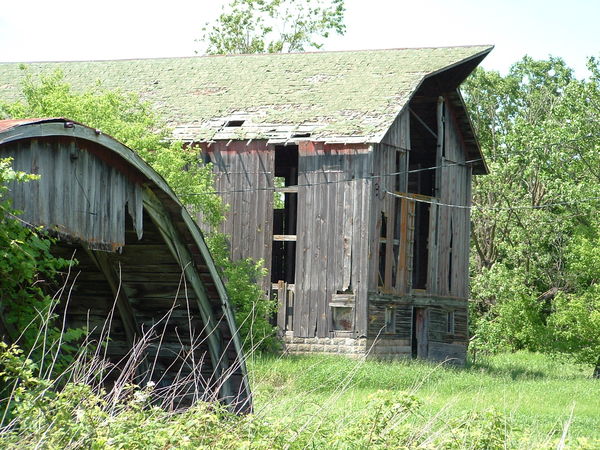 part of a machine shed and front of barn...