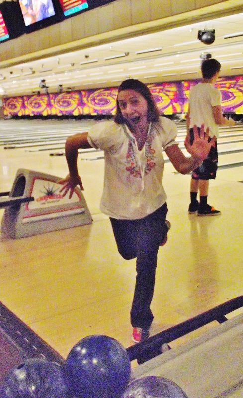 Daughter being goofy inside the bowling alley on M...