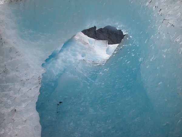 Inside a glacier looking thro the 'chimney...