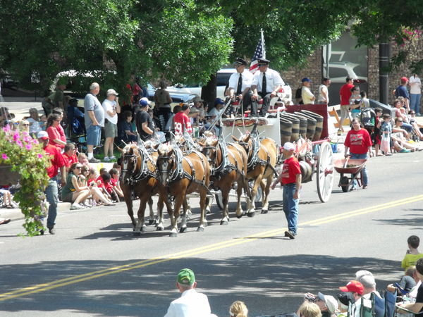 Beer wagon going through the parade with the handl...