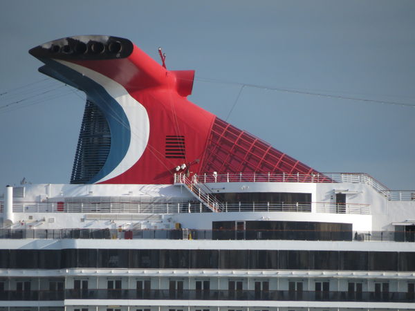 This red top of the boat is hidden from view by th...