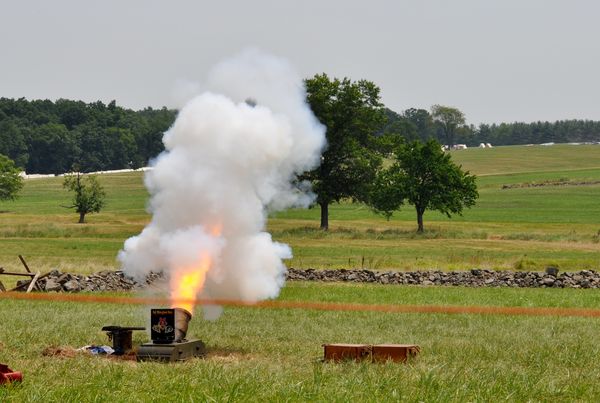 Mortar firing, if you look at the top of the smoke...