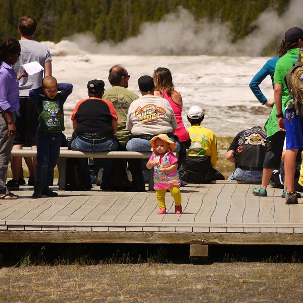 Waiting for Old Faithful. She was so cute,...