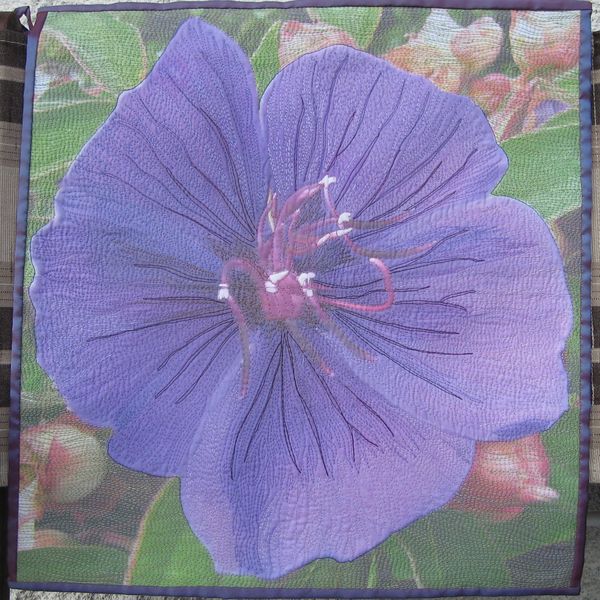 The flower, printed onto fabric, sewn together, th...
