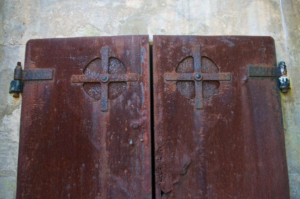The rusted doors in an old fortress...