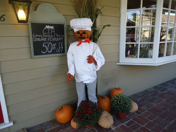 Scarecrow outside cooking store...