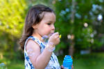 Learning to blow bubbles....she did pretty good:)...