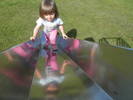 Climbing the slide the wrong way on a sunny day in...