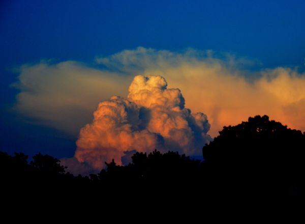 High Cumulus Clouds at Sunset...