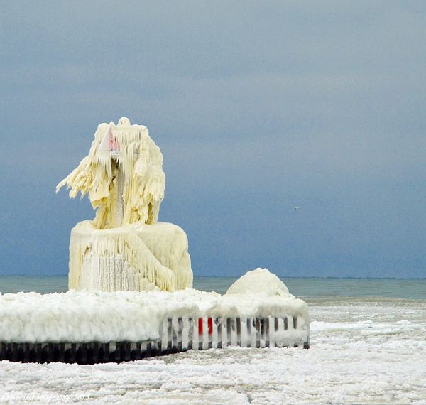 Pier marker caked in ice...