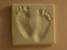Plastercast of our first grandaughter's tiny feet ...