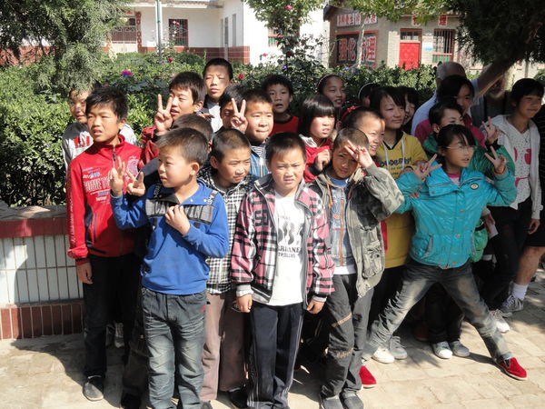 Chinese kids posing in the schoolyard...