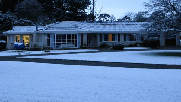Our place,  August 2011,with snow, that seldom fal...