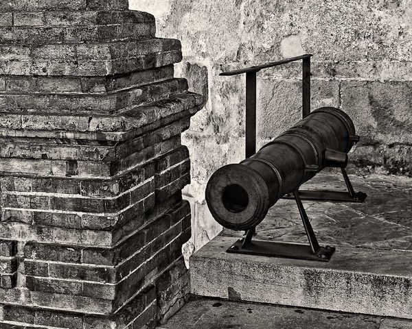 Old Cannon at Building Entrance, Spain....