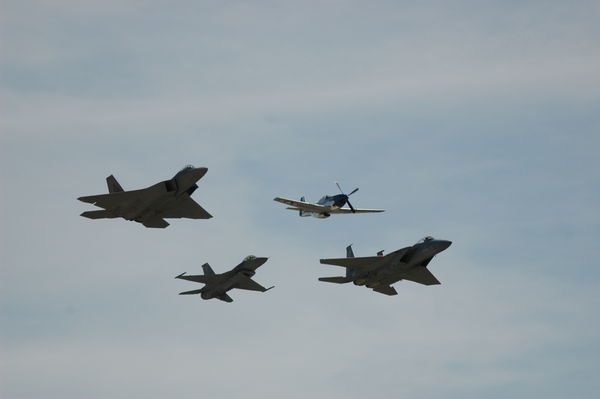 P51 mustang leading F15, F16, And F22...