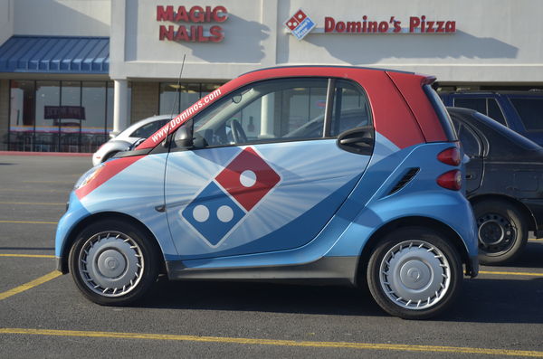 How many pizza's can fit in here with driver?...