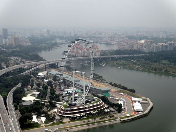 To the east the Singapore Flyer....