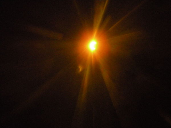 used a welding lens to attempt catching the eclips...